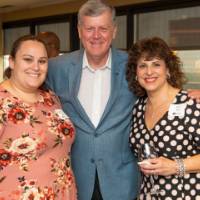 tom poses with attendees